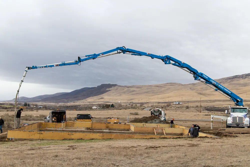 Concrete foundation pour for an Anasazi Builders custom home on a rural Tri-Cities site