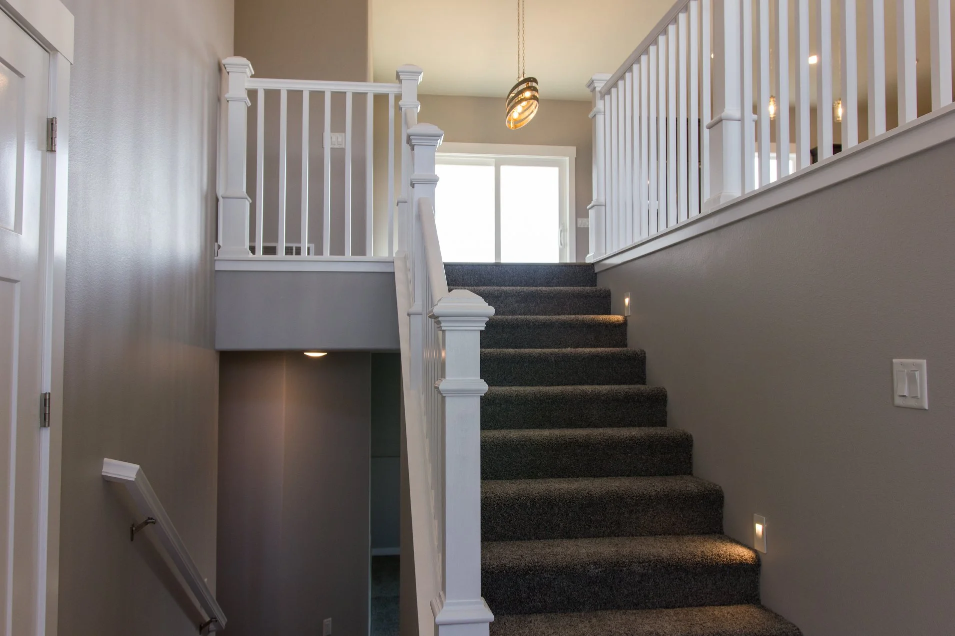 Anasazi Builders Custom Home Interior Staircase with Step Lighting.