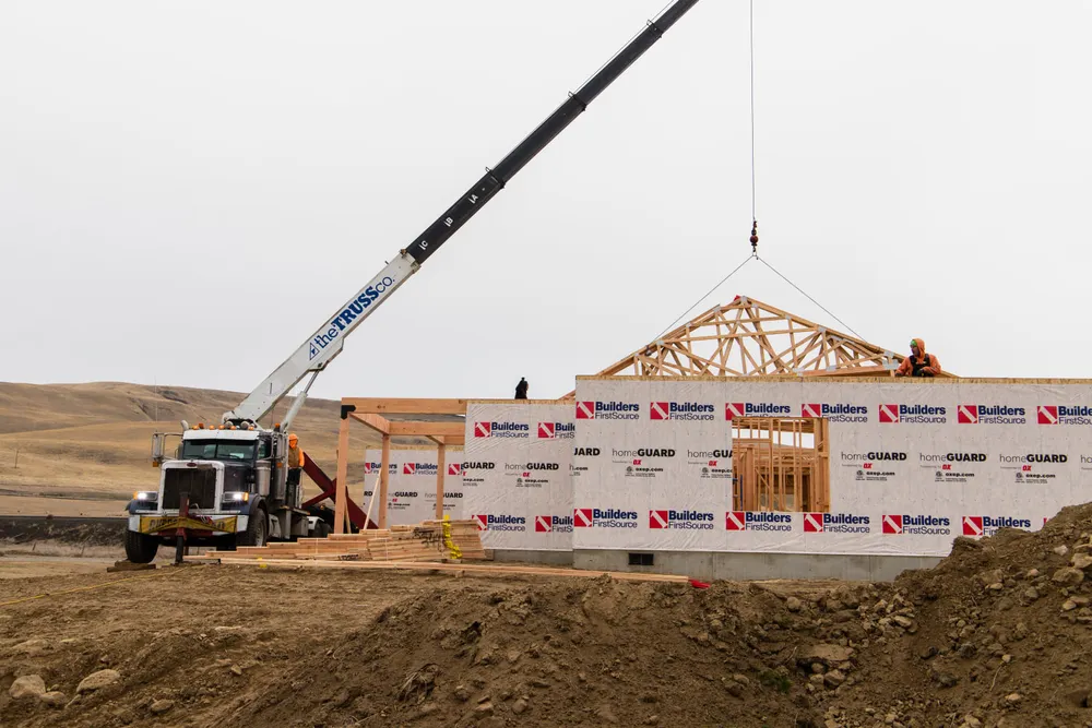 Close-up of engineered wood floor joists and subflooring installed by Anasazi Builders in Tri-Cities.