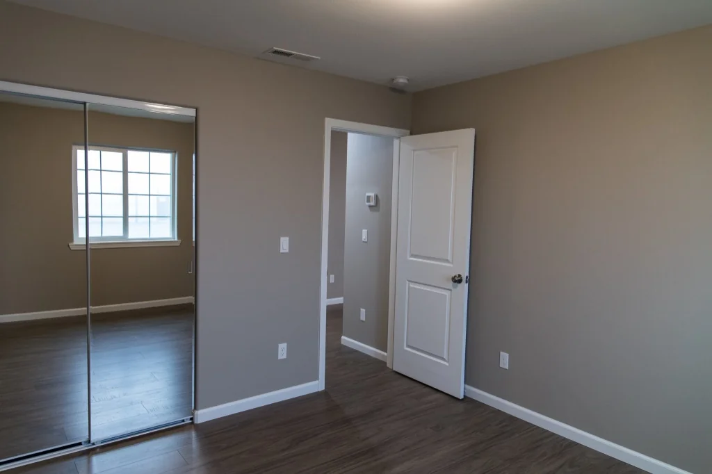 Anasazi Builders Custom Bedroom with Mirror Closet Doors.