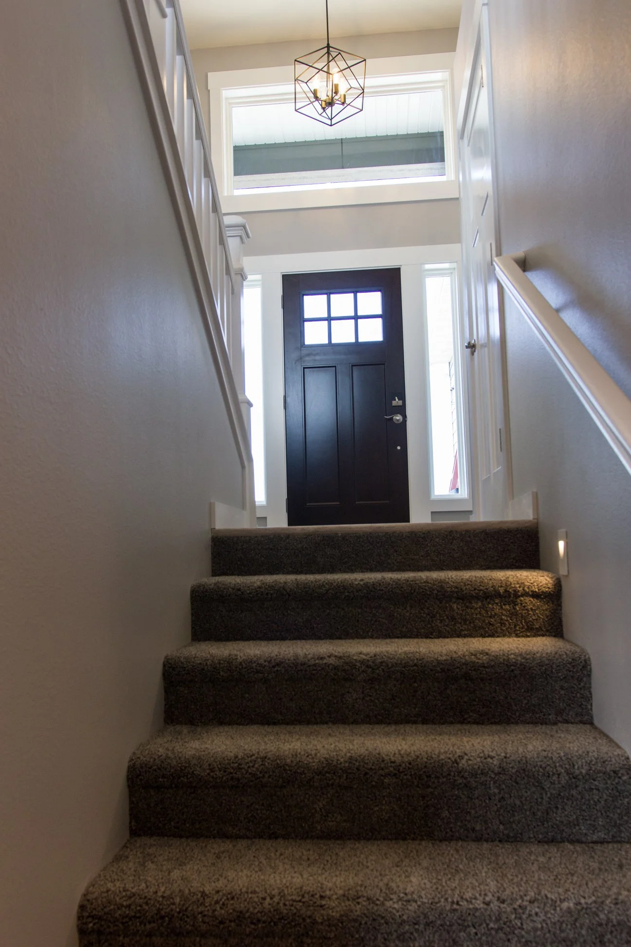 Anasazi Builders Custom Home Entrance View from Stairs.
