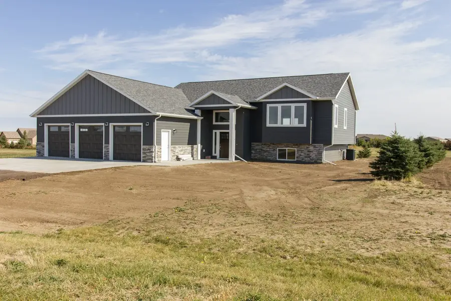 Anasazi Builders Custom Multi-Level Home with Three-Car Garage
