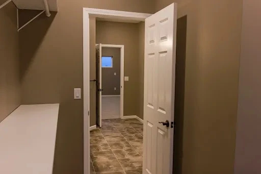 Anasazi Builders Custom Walk-in Closet and Hallway Transition.