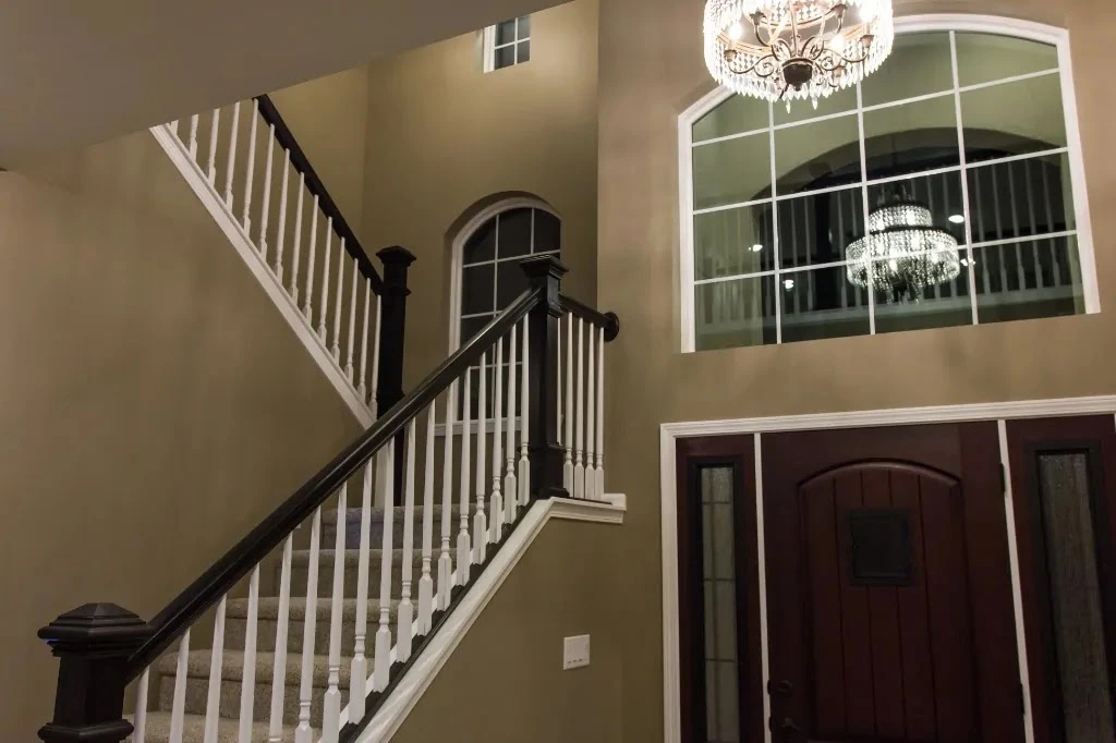 Anasazi Builders Luxury Foyer with Grand Staircase and Chandelier.
