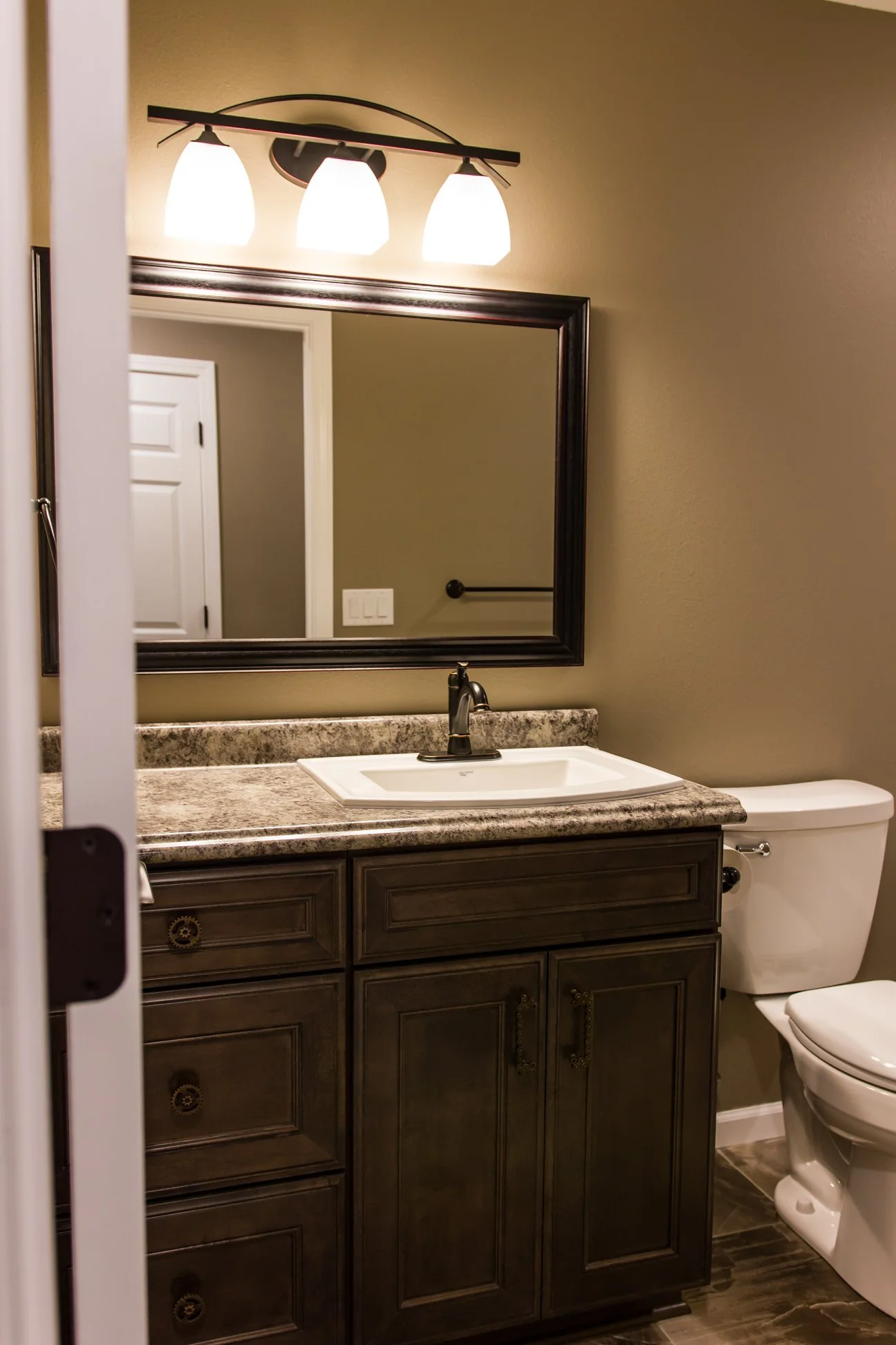 Anasazi Builders Modern Bathroom with Custom Vanity and Finishes.