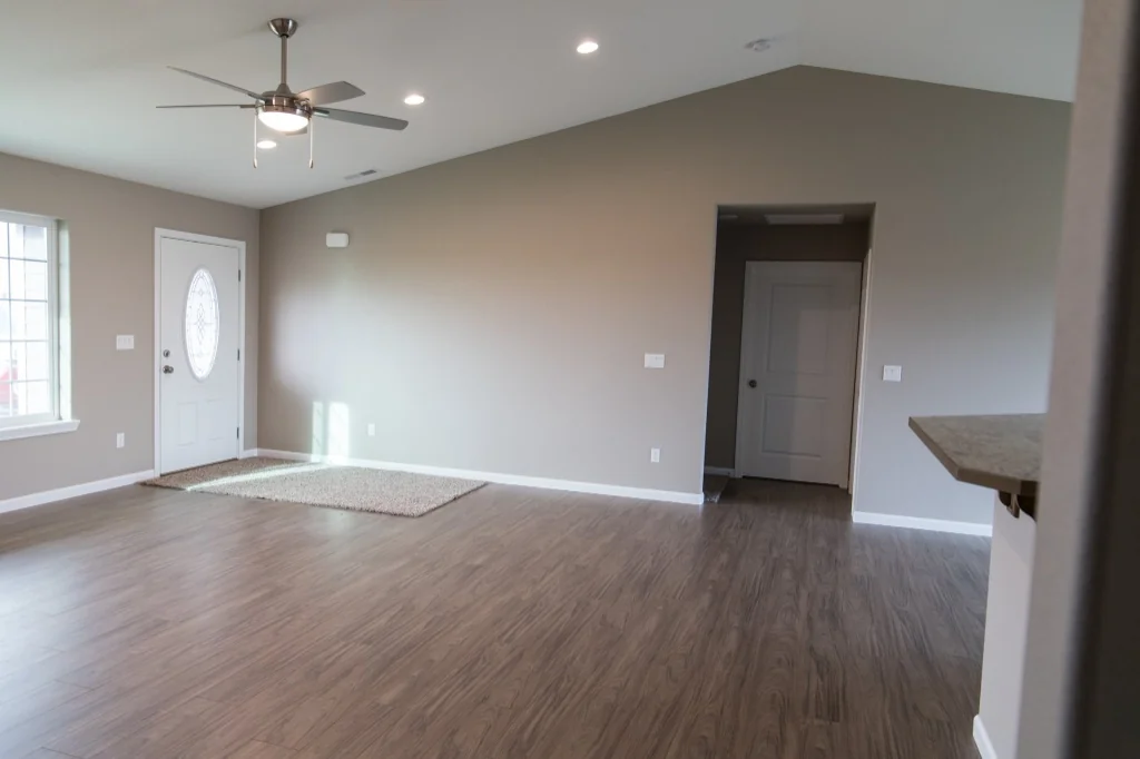 Anasazi Builders Open Concept Living Area with Modern Flooring.