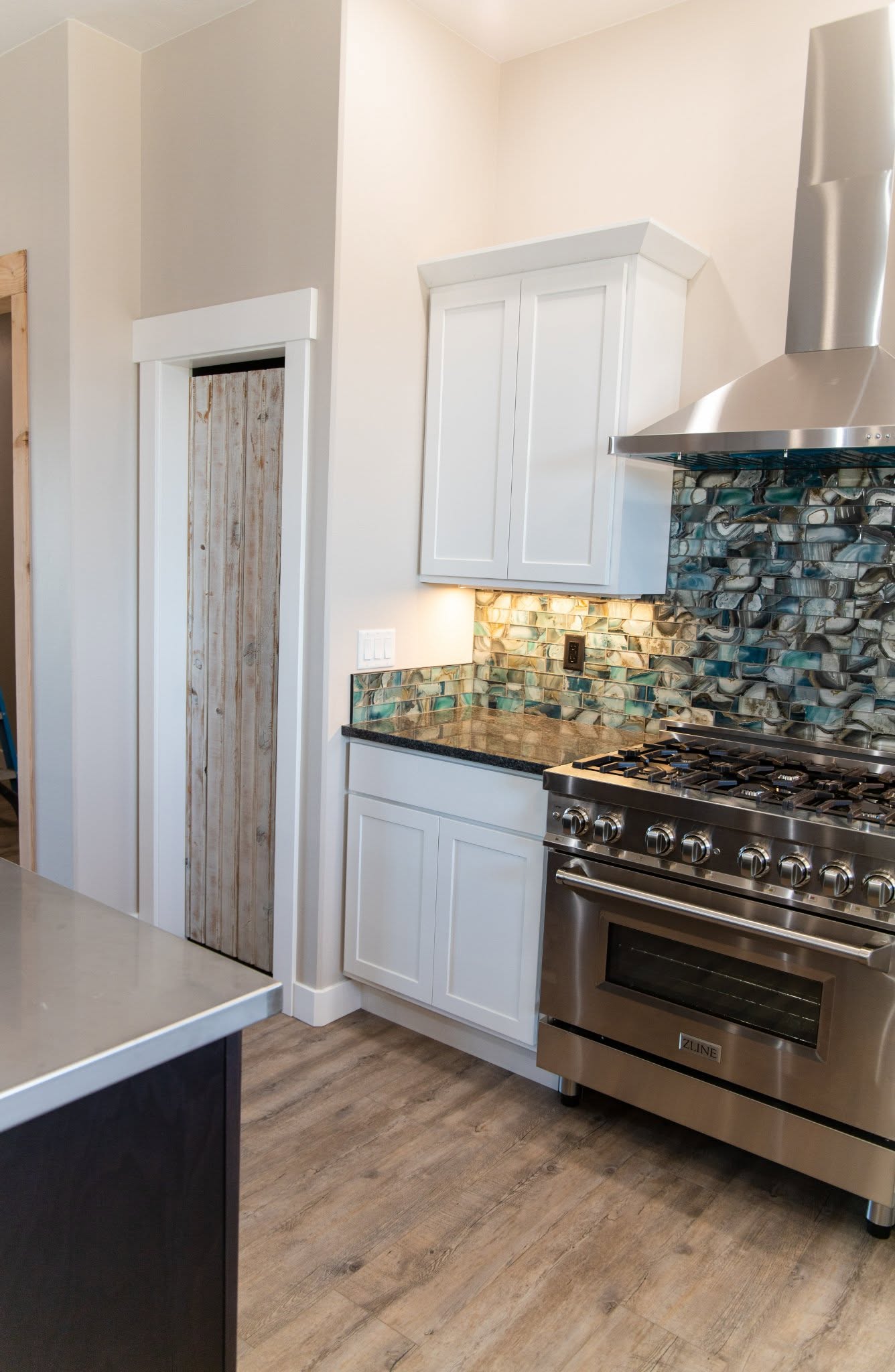 Wide view of the living and kitchen area
