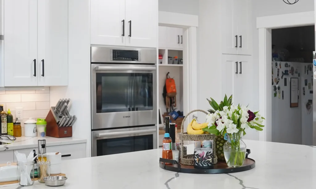 Completed white custom kitchen by Anasazi Builders representing a $400,000 home budget